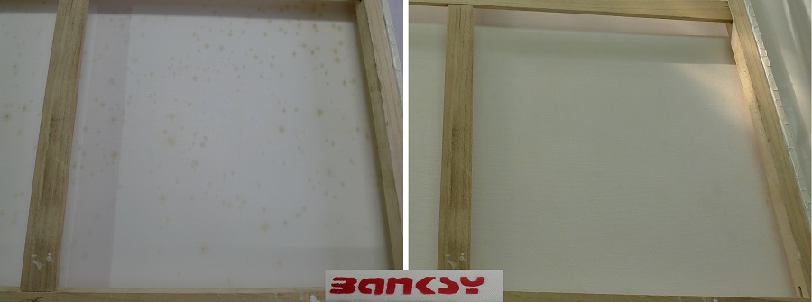 Before and after the removal of mould from the back of a Banksy.
